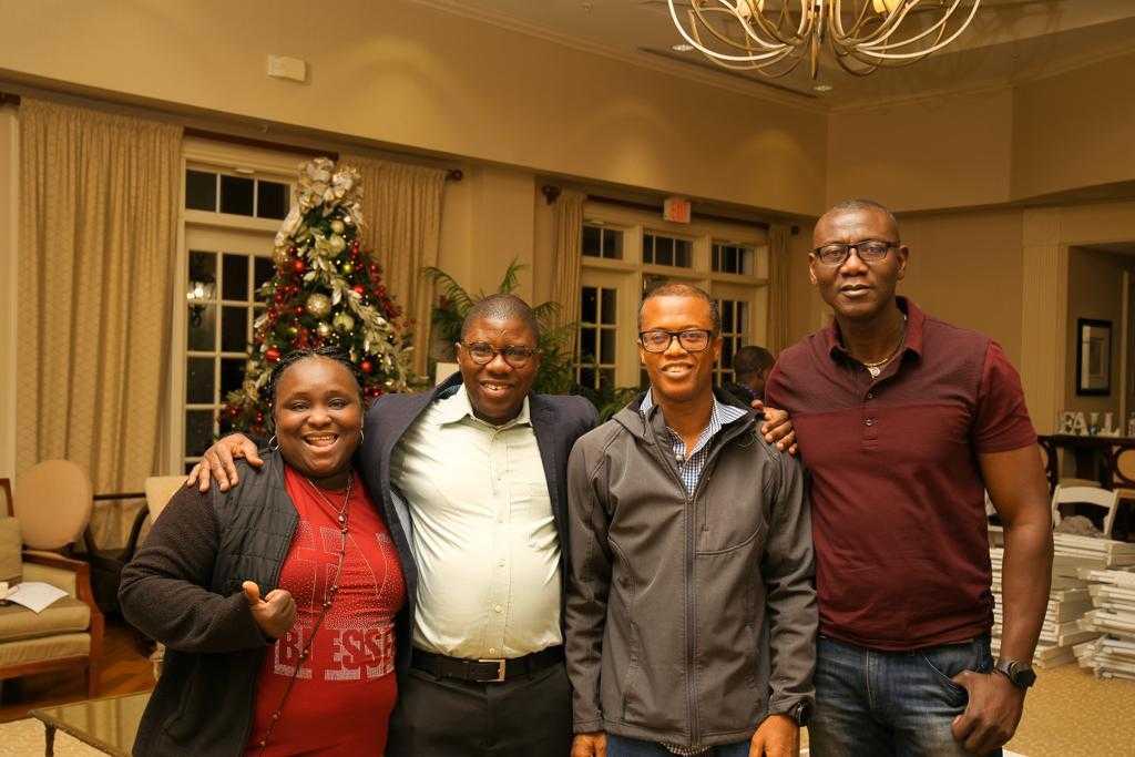 Four Sababu Fund members posing for a group picture at the 2023 AGM